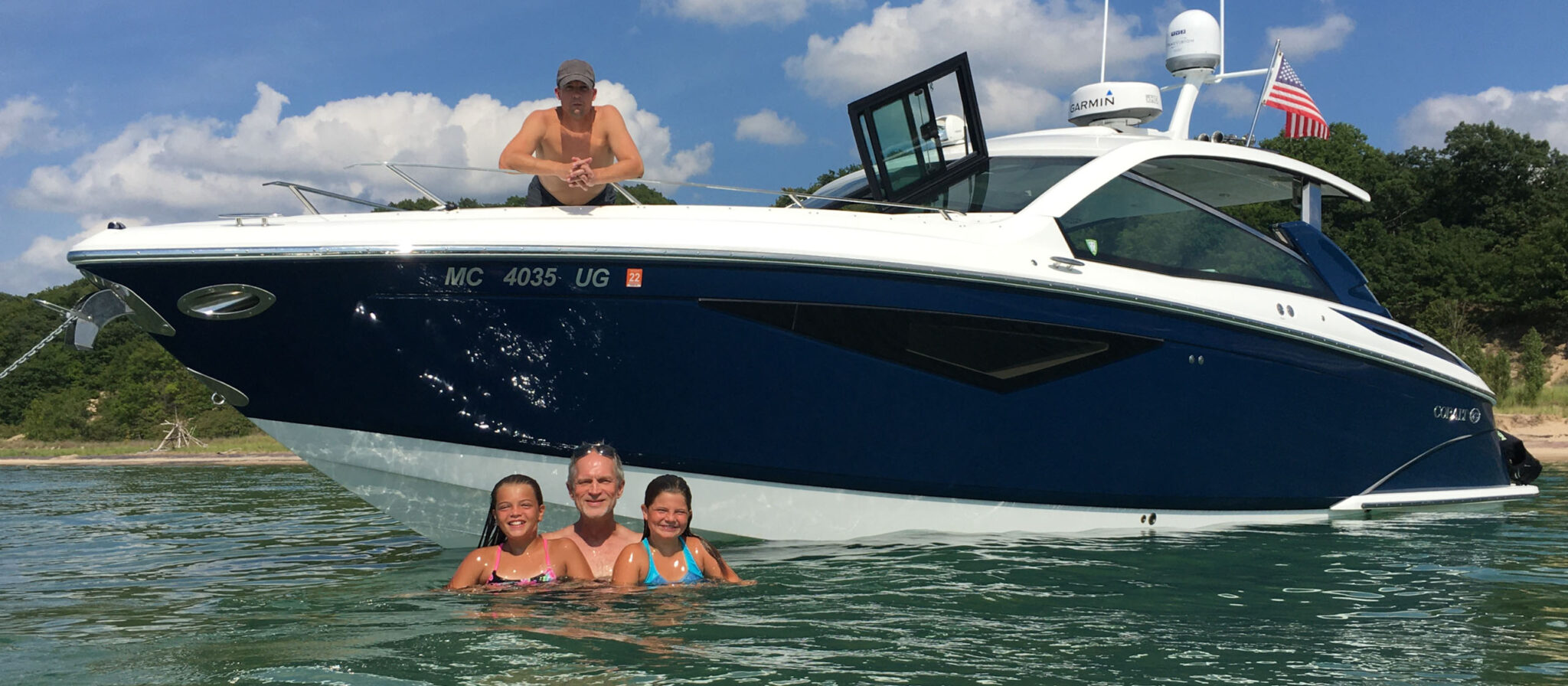 people by boat swimming