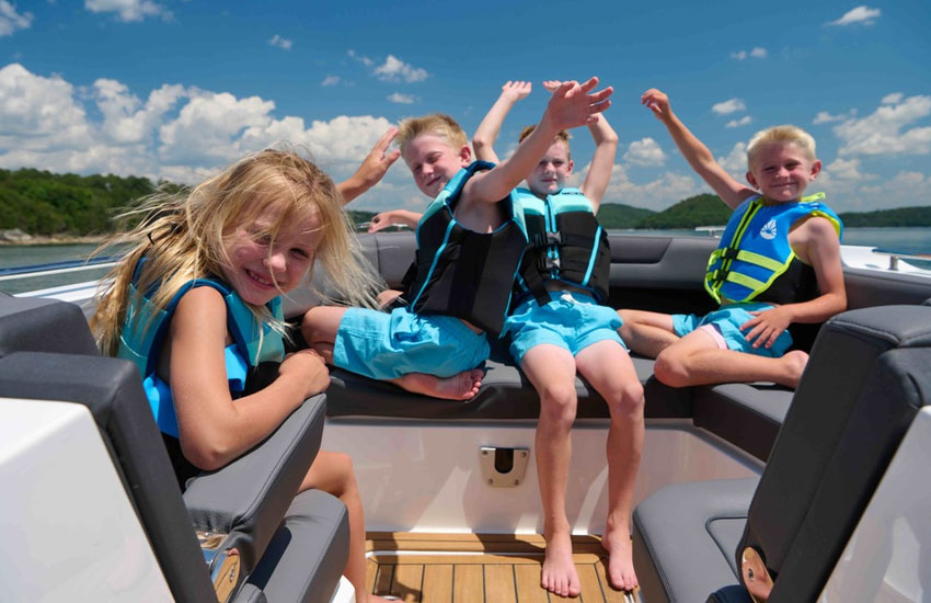 kids on a boat