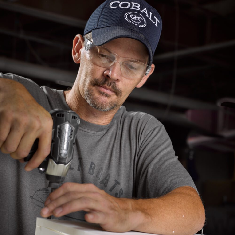 man working with drill