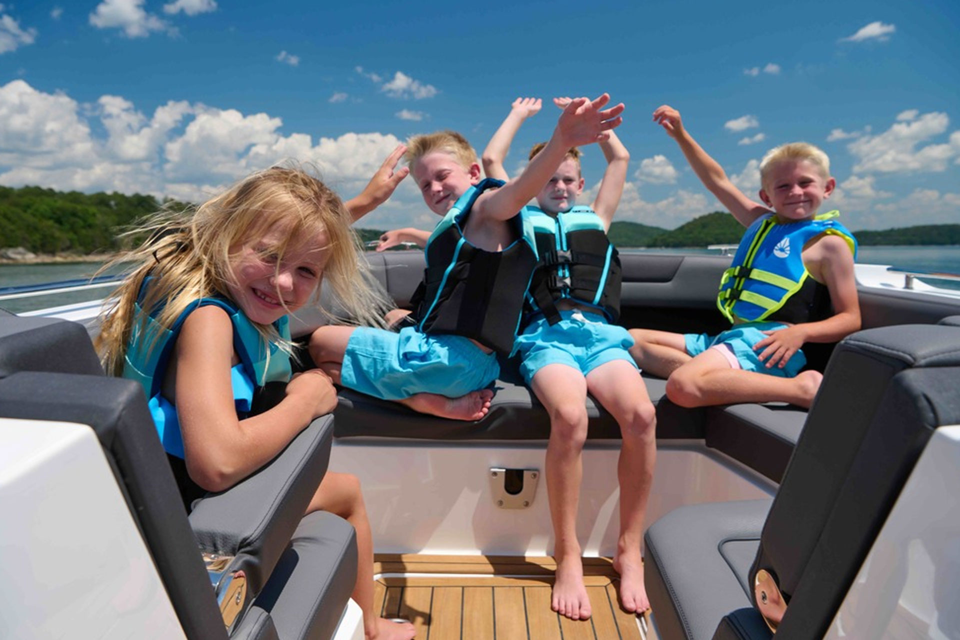 kids on a boat