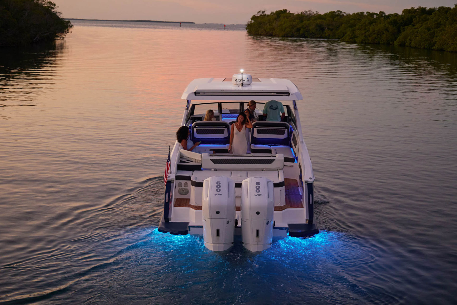 people in a boat at night