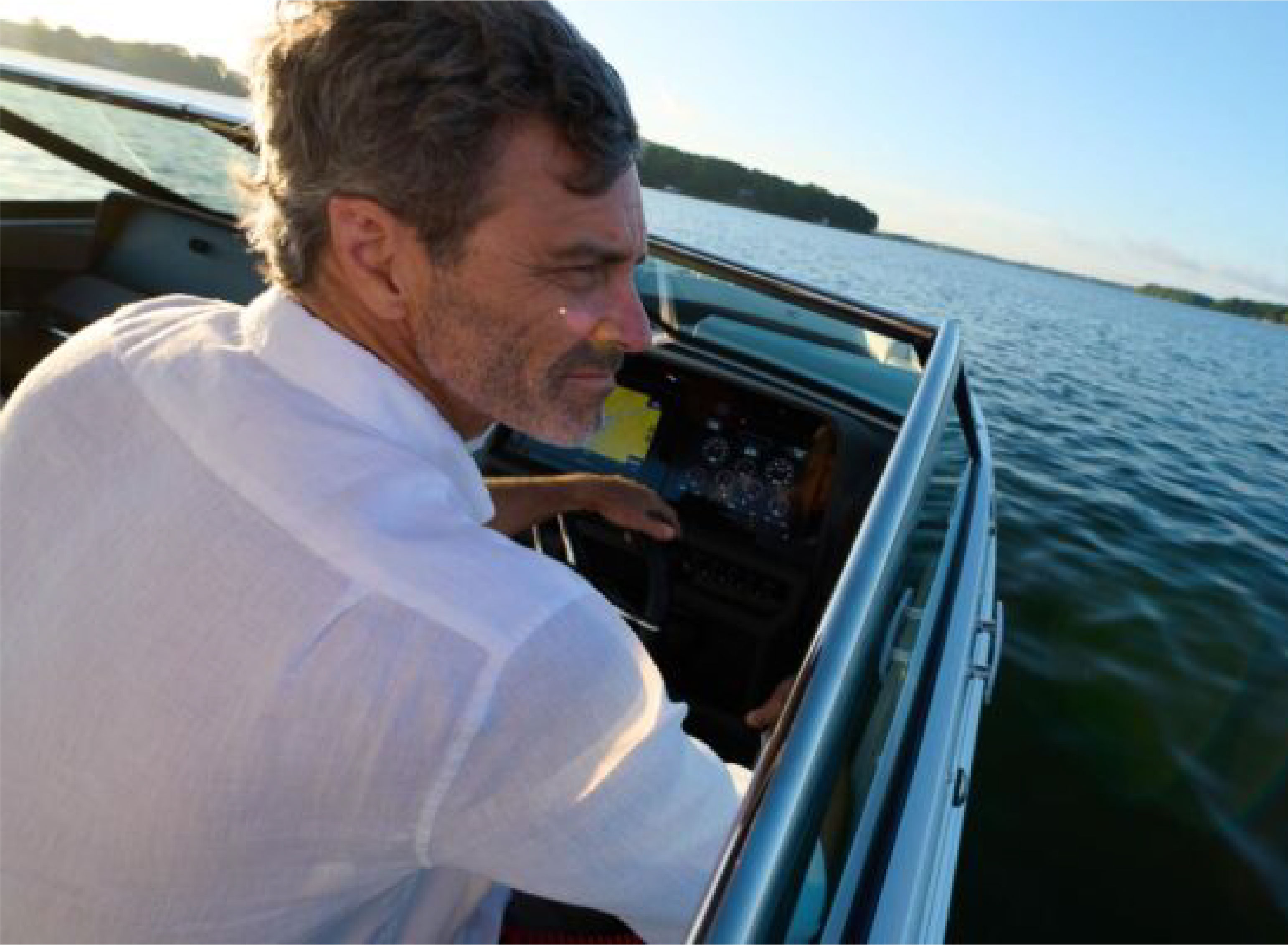 man driving a boat