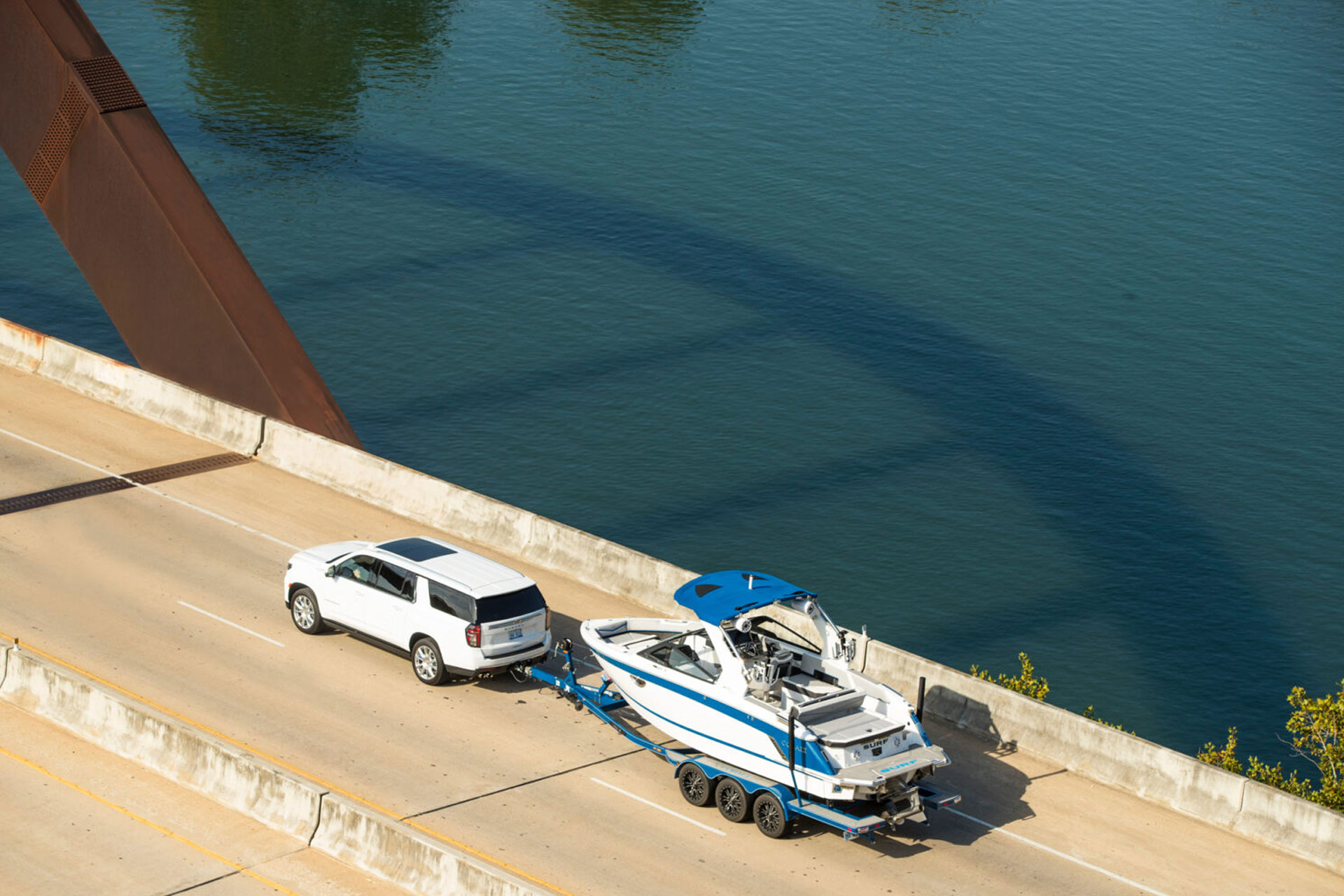boat being towed on the highway
