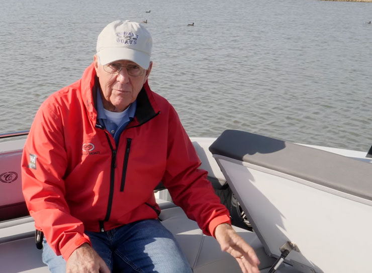 man sitting on boat