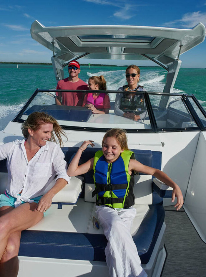 Sterndrive Class Cobalt boat with family riding boat
