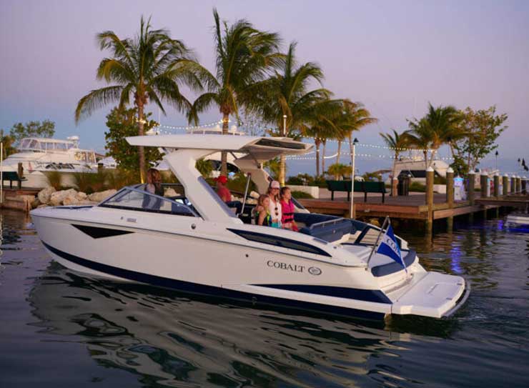 people enjoying the water on a boat