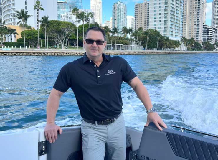 man in polo shirt on boat