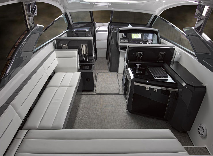 All the room of a deck boat with the facilities of a cruising boat