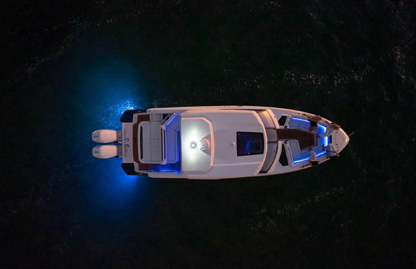 A Cobalt outboard lighting up the night.
