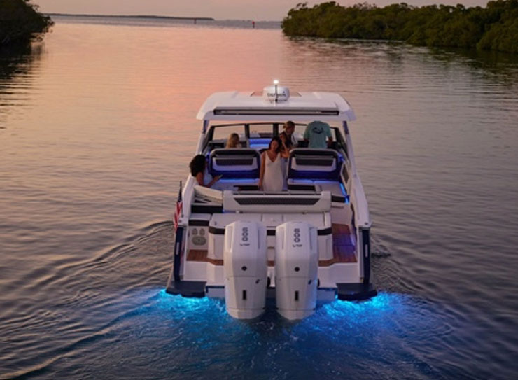 boat at night with blue lights
