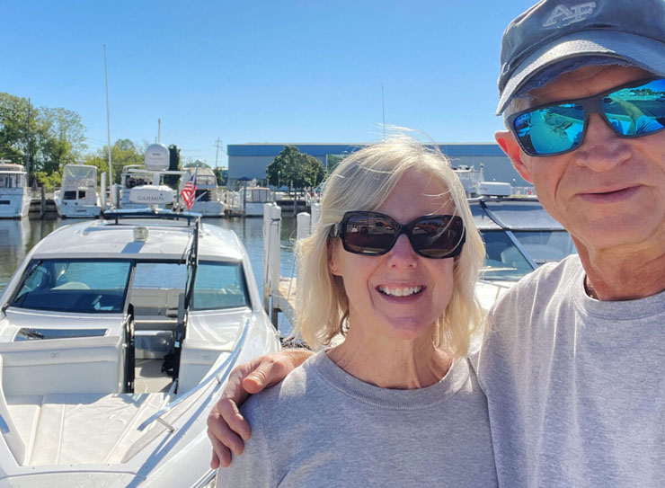Proof that Cobalt Boats belong on Lake Michigan: Bill & Sharon with their Cobalt A36 behind them.