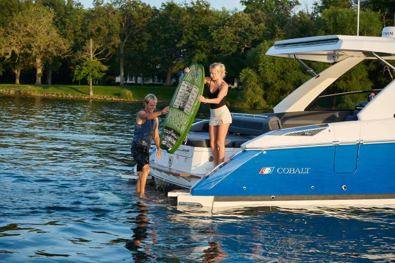 people on the back of a boat