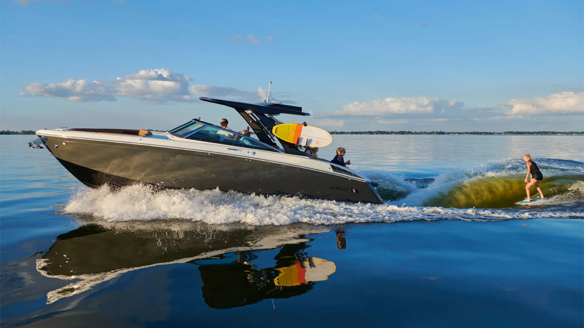 boat with a wakesurfer